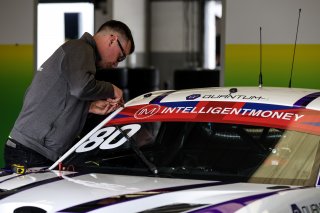 A Toro Verde team member fits a new sun strip
 | British GT/JEP